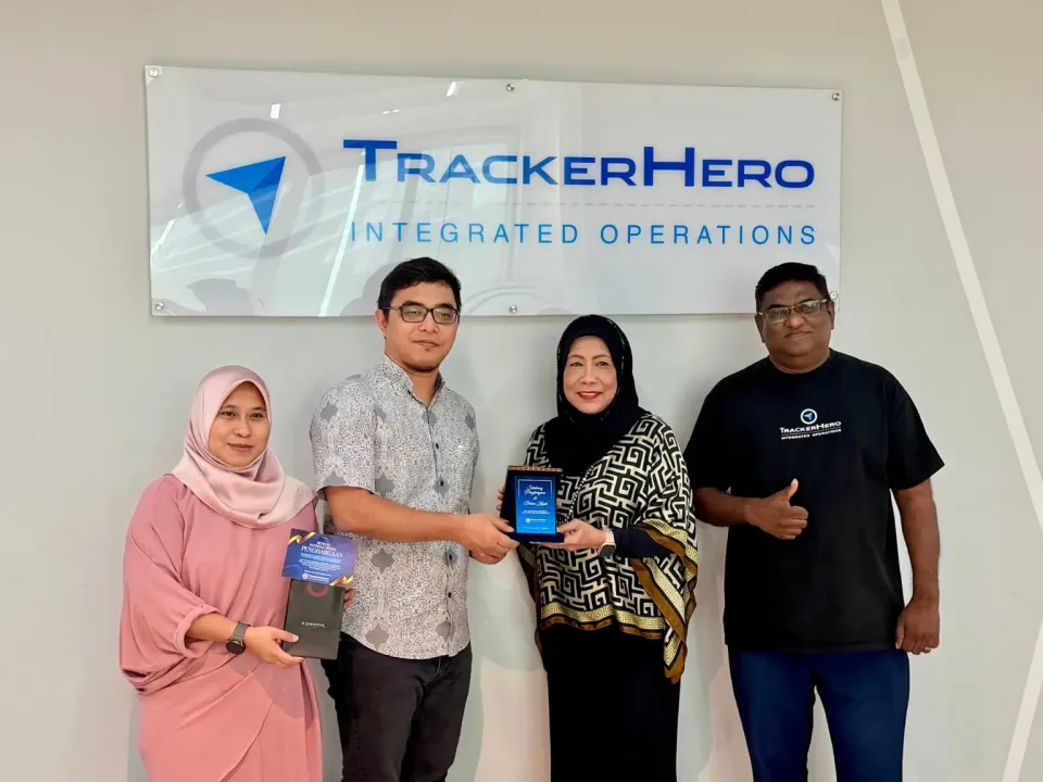 TrackerHero team with visiting partners at the TrackerHero office